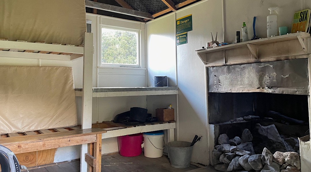 Open fire means great ventilation. | Unknown Stream Hut, Craigieburn Forest Park