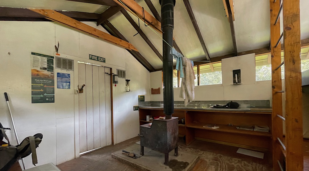 That woodburner is way too close to the front door. | Wharfedale Hut, Oxford Forest Conservation Area