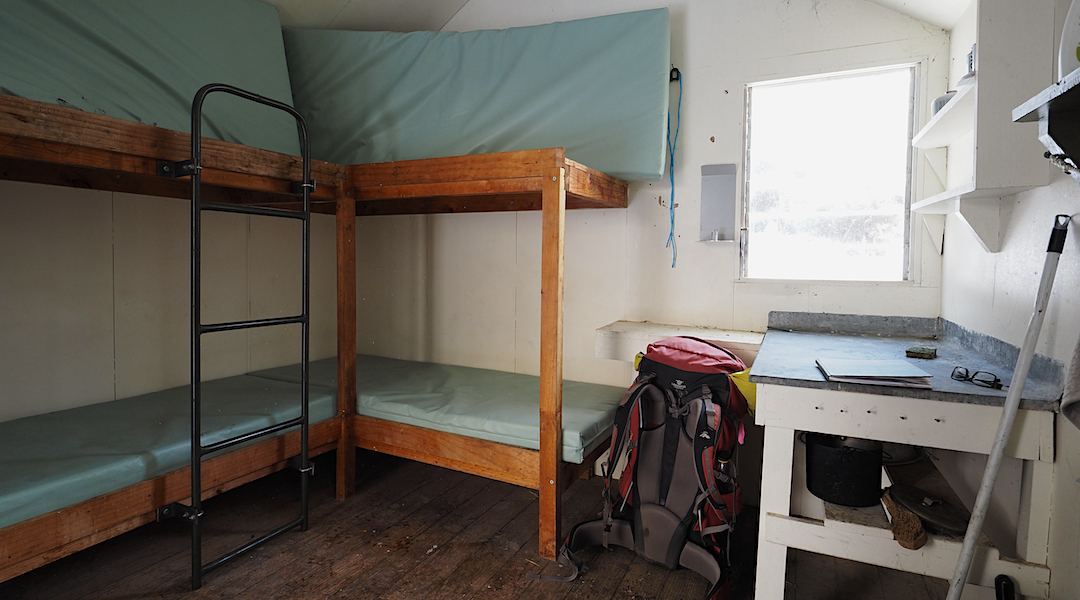 The hut has good space for just the four bunks.  | Alfred Hut, Ka Whata Tu o Rakihouia/Clarence Conservation Park