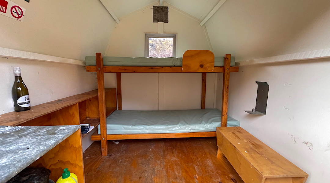 The interior was refurbished when it was relocated. | Palmer Bivvy, Ka Whata Tu o Rakihouia/Clarence Conservation Park