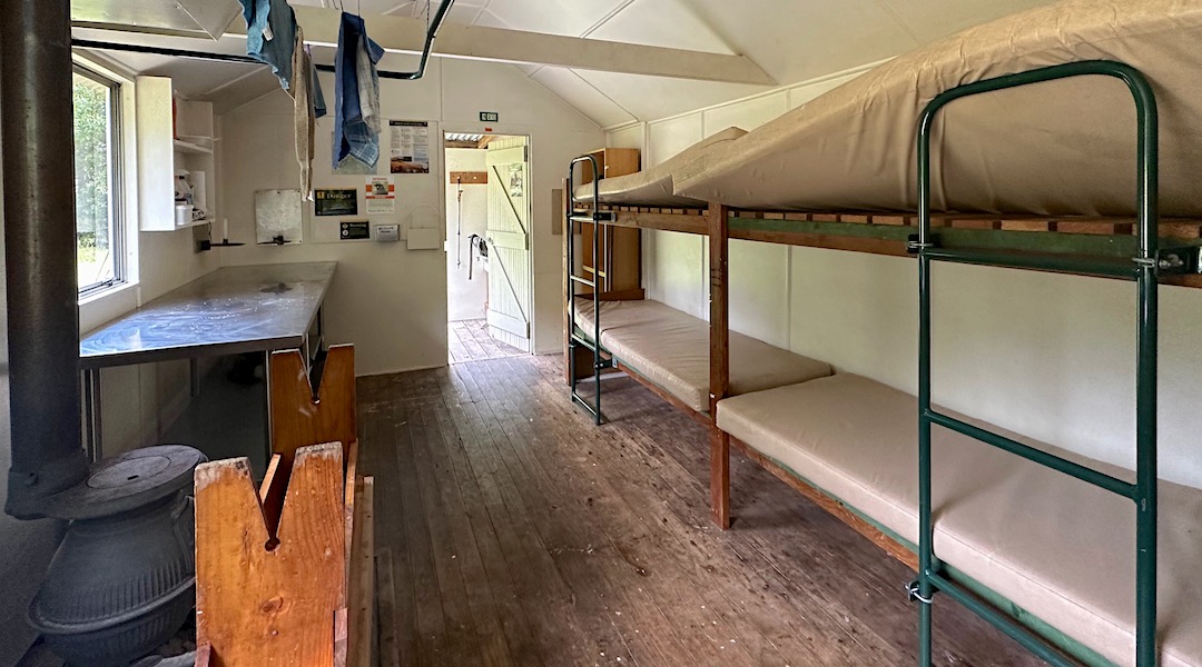 Bench and bunks. | Kowhai Hut, Ka Whata Tu o Rakihouia Conservation Park