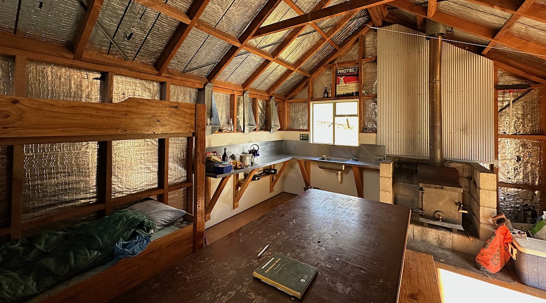 Kitchen & woodburner end. Bring your own wood. | Top Hut new, Oteake Conservation Park