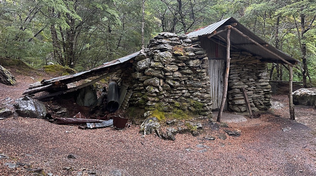 Exterior in the rain. | Sam Summers Hut, Mt Crichton Scenic Reserve