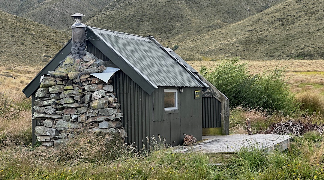 The stone fireplace is from 1896. | Spurs Hut, Te Kahui Kaupeka Conservation Park