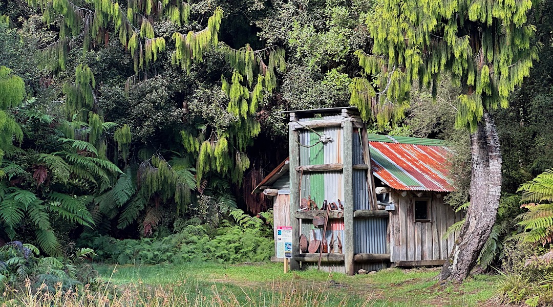 The 1999 replica hut is based on a 1882 miner's hut. | Adams Flat Hut, Kahurangi National Park