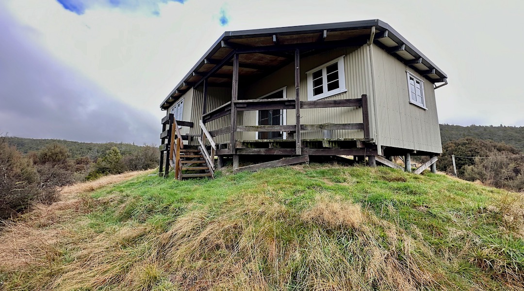 The hut has an outside deck. | Big River Hut, Big River Ecological Area