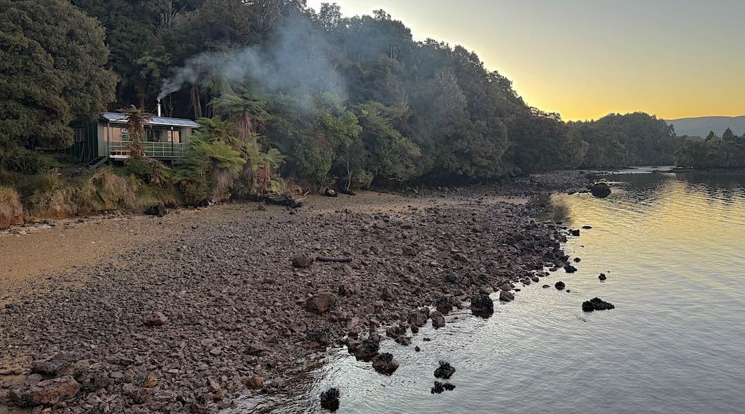 Start of the blue mussel beds out the front to the hut. | Freds Camp Hut, Southern Circuit, Rakiura