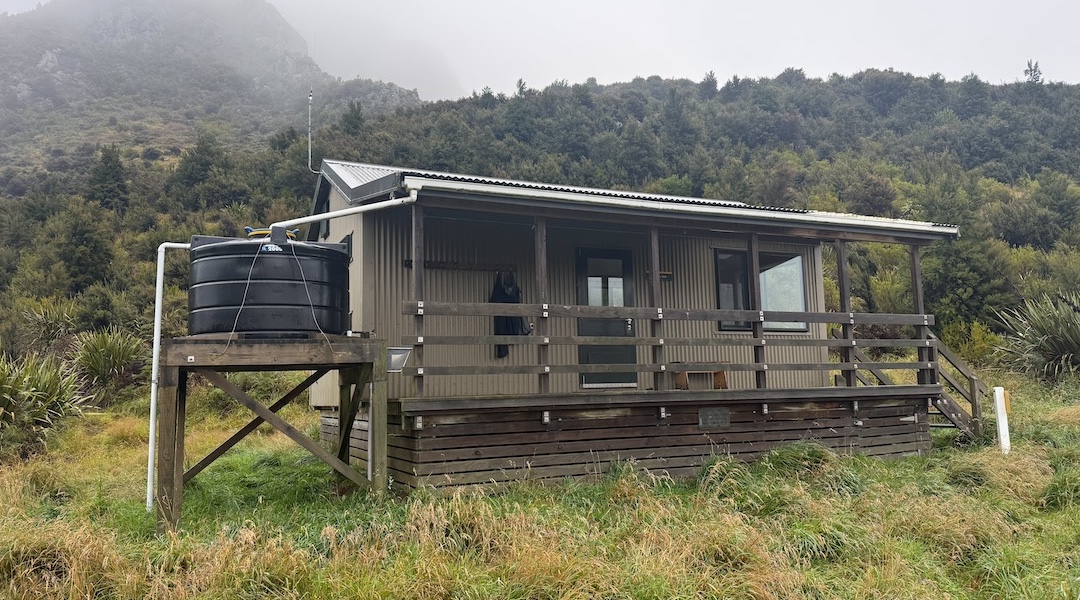 Jubilee Hut does get sun, on a sunny day. | Jubilee Hut, Silverpeaks Scenic Reserve